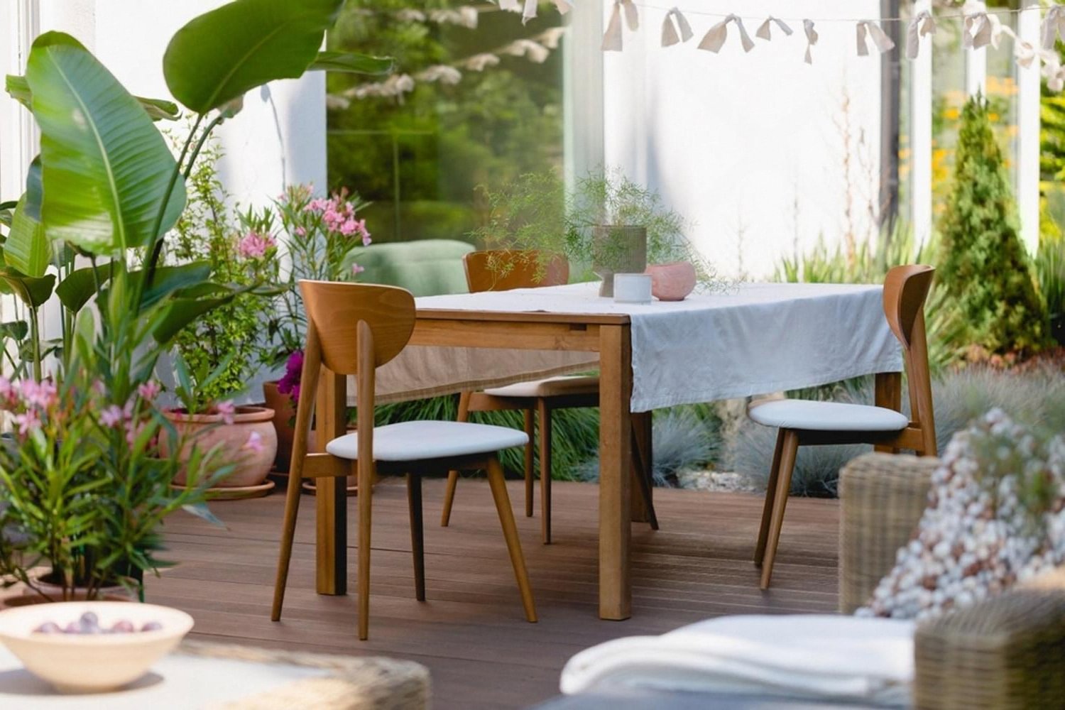 Outdoor event setup in the UAE with rented wooden table and chairs